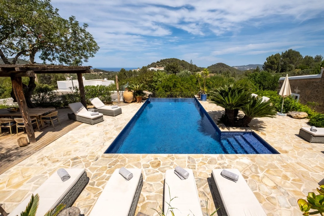 1684146344-Prospectors Luxury real estate Ibiza to rent villa Can Xauret spain property rental pool outside.webp